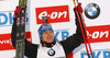 Third placed Andreas Birnbacher of Germany celebrates his medal won in Men sprint race of IBU Biathlon World Cup in Hochfilzen, Austria. Men sprint race of IBU Biathlon World cup was held on Friday, 12th of December 2014 in Hochfilzen, Austria.
