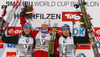 Winner Johannes Thingnes Boe of Norway (M), second placed Simon Schempp of Germany (L) and third placed Andreas Birnbacher of Germany (R) celebrate their medals won in Men sprint race of IBU Biathlon World Cup in Hochfilzen, Austria. Men sprint race of IBU Biathlon World cup was held on Friday, 12th of December 2014 in Hochfilzen, Austria.
