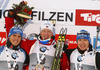 Winner Johannes Thingnes Boe of Norway (M), second placed Simon Schempp of Germany (L) and third placed Andreas Birnbacher of Germany (R) celebrate their medals won in Men sprint race of IBU Biathlon World Cup in Hochfilzen, Austria. Men sprint race of IBU Biathlon World cup was held on Friday, 12th of December 2014 in Hochfilzen, Austria.
