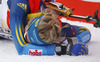 Emma Nilsson of Sweden laying in snow exhausted after end of her leg during Women relay race of IBU Biathlon World Cup in Hochfilzen, Austria. Women relay race of IBU Biathlon World cup was held on Saturday, 13th of December 2014 in Hochfilzen, Austria.

