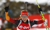 Franziska Preuss of Germany celebrates while crossing finish line as winner during Women relay race of IBU Biathlon World Cup in Hochfilzen, Austria. Women relay race of IBU Biathlon World cup was held on Saturday, 13th of December 2014 in Hochfilzen, Austria.
