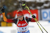 Franziska Preuss of Germany celebrates while crossing finish line as winner during Women relay race of IBU Biathlon World Cup in Hochfilzen, Austria. Women relay race of IBU Biathlon World cup was held on Saturday, 13th of December 2014 in Hochfilzen, Austria.
