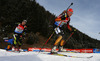 Franziska Hildebrand of Germany (front) and Enora Latuilliere of France (back) skiing during Women relay race of IBU Biathlon World Cup in Hochfilzen, Austria. Women relay race of IBU Biathlon World cup was held on Saturday, 13th of December 2014 in Hochfilzen, Austria.
