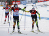 Nadzeya Pisareva of Belarus (R) changes to Darya Domracheva of Belarus (L) after end of third leg during Women relay race of IBU Biathlon World Cup in Hochfilzen, Austria. Women relay race of IBU Biathlon World cup was held on Saturday, 13th of December 2014 in Hochfilzen, Austria.
