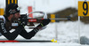 Serafin Wiestner of Switzerland shooting during Men relay race of IBU Biathlon World Cup in Hochfilzen, Austria. Men relay race of IBU Biathlon World cup was held on Saturday, 13th of December 2014 in Hochfilzen, Austria.
