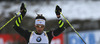 Martin Fourcade of France celebrates second place of his relay when crossing finish line of the Men relay race of IBU Biathlon World Cup in Hochfilzen, Austria. Men relay race of IBU Biathlon World cup was held on Saturday, 13th of December 2014 in Hochfilzen, Austria.
