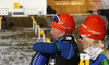 Kaisa Makarainen of Finland (L) and Mari Laukkanen of Finland (R) during warming up and zeroing before start of the Women pursuit race of IBU Biathlon World Cup in Hochfilzen, Austria. Women pursuit race of IBU Biathlon World cup was held on Sunday, 14th of December 2014 in Hochfilzen, Austria.
