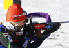 Mari Laukkanen of Finland during warming up and zeroing before start of the Women pursuit race of IBU Biathlon World Cup in Hochfilzen, Austria. Women pursuit race of IBU Biathlon World cup was held on Sunday, 14th of December 2014 in Hochfilzen, Austria.
