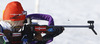 Mari Laukkanen of Finland during warming up and zeroing before start of the Women pursuit race of IBU Biathlon World Cup in Hochfilzen, Austria. Women pursuit race of IBU Biathlon World cup was held on Sunday, 14th of December 2014 in Hochfilzen, Austria.
