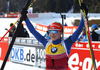 Winner Kaisa Makarainen of Finland celebrates her victory in finish of the Women pursuit race of IBU Biathlon World Cup in Hochfilzen, Austria. Women pursuit race of IBU Biathlon World cup was held on Sunday, 14th of December 2014 in Hochfilzen, Austria.
