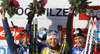 Winner Kaisa Makarainen of Finland (M), second placed Ekaterina Glazyrina of Russia (L) and third placed Anais Bescond of France (R) celebrate their medals won in Women pursuit race of IBU Biathlon World Cup in Hochfilzen, Austria. Women pursuit race of IBU Biathlon World cup was held on Sunday, 14th of December 2014 in Hochfilzen, Austria.
