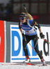 Elisa Gasparin of Switzerland skiing in the Women pursuit race of IBU Biathlon World Cup in Hochfilzen, Austria. Women pursuit race of IBU Biathlon World cup was held on Sunday, 14th of December 2014 in Hochfilzen, Austria.
