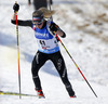 Elisa Gasparin of Switzerland skiing in the Women pursuit race of IBU Biathlon World Cup in Hochfilzen, Austria. Women pursuit race of IBU Biathlon World cup was held on Sunday, 14th of December 2014 in Hochfilzen, Austria.
