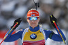 Winner Kaisa Makarainen of Finland celebrating her victory when crossing finish line of the Women pursuit race of IBU Biathlon World Cup in Hochfilzen, Austria. Women pursuit race of IBU Biathlon World cup was held on Sunday, 14th of December 2014 in Hochfilzen, Austria.
