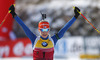 Winner Kaisa Makarainen of Finland celebrating her victory when crossing finish line of the Women pursuit race of IBU Biathlon World Cup in Hochfilzen, Austria. Women pursuit race of IBU Biathlon World cup was held on Sunday, 14th of December 2014 in Hochfilzen, Austria.
