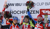 Winner Martin Fourcade of France (M), second placed Simon Schempp of Germany (L) and third placed Jakov Fak of Slovenia (R) celebrate their medals won in the Men pursuit race of IBU Biathlon World Cup in Hochfilzen, Austria. Men pursuit race of IBU Biathlon World cup was held on Sunday, 14th of December 2014 in Hochfilzen, Austria.
