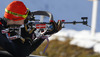 Olli Hiidensalo of Finland during warming up and zeroing before start of the Men pursuit race of IBU Biathlon World Cup in Hochfilzen, Austria. Men pursuit race of IBU Biathlon World cup was held on Sunday, 14th of December 2014 in Hochfilzen, Austria.
