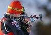 Olli Hiidensalo of Finland during warming up and zeroing before start of the Men pursuit race of IBU Biathlon World Cup in Hochfilzen, Austria. Men pursuit race of IBU Biathlon World cup was held on Sunday, 14th of December 2014 in Hochfilzen, Austria.
