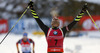 Winner Martin Fourcade of France celebrates his victory crossing the finish line in the Men pursuit race of IBU Biathlon World Cup in Hochfilzen, Austria. Men pursuit race of IBU Biathlon World cup was held on Sunday, 14th of December 2014 in Hochfilzen, Austria.
