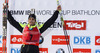 Winner Martin Fourcade of France celebrates his medal won in the Men pursuit race of IBU Biathlon World Cup in Hochfilzen, Austria. Men pursuit race of IBU Biathlon World cup was held on Sunday, 14th of December 2014 in Hochfilzen, Austria.
