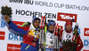 Martin Fourcade of France (L), winner Simon Schempp of Fermany (M) and Terjei Boe of Norway (R) celebrates their medals won in the Men sprint race of IBU Biathlon World Cup in Hochfilzen, Austria. Men sprint race of IBU Biathlon World cup was held on Friday, 11th of December 2015 in Hochfilzen, Austria.
