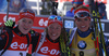 Winner Laura Dahlmeier of Germany (M), second placed Maren Hammerschmidt of Germany (L) and third placed Gabriela Soukalova of Czech (R) celebrate their performance in finish area during the Women pursuit race of IBU Biathlon World Cup in Hochfilzen, Austria. Women pursuit race of IBU Biathlon World cup was held on Saturday, 12th of December 2015 in Hochfilzen, Austria.
