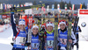 Italian team with Lisa Vittozzi, Karin Oberhofer, Federica Sanfilippo and Dorothea Wierer celebrating their victory in the Women relay race of IBU Biathlon World Cup in Hochfilzen, Austria. Women relay race of IBU Biathlon World cup was held on Sunday, 13th of December 2015 in Hochfilzen, Austria.
