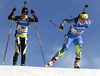 Luminita Piscoran of Romania (L) and Johanna Talihaerm of Estonia skiing during the Women relay race of IBU Biathlon World Cup in Hochfilzen, Austria. Women relay race of IBU Biathlon World cup was held on Sunday, 13th of December 2015 in Hochfilzen, Austria.
