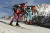 Evgeniy Garanichev of Russia (L) and Oleksander Zhyrnyi of Ukraine skiing during the Men relay race of IBU Biathlon World Cup in Hochfilzen, Austria. Men relay race of IBU Biathlon World cup was held on Sunday, 13th of December 2015 in Hochfilzen, Austria.
