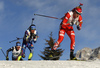 Lukas Hofer of Italy (L), Quentin Fillon Maillet of France and Johannes Thingnes Boe of Norway skiing during the Men relay race of IBU Biathlon World Cup in Hochfilzen, Austria. Men relay race of IBU Biathlon World cup was held on Sunday, 13th of December 2015 in Hochfilzen, Austria.
