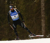 Serafin Wiestner of Switzerland skiing during the Men sprint race of IBU Biathlon World Cup in Pokljuka, Slovenia. Men sprint race of IBU Biathlon World cup was held on Thursday, 17th of December 2015 in Pokljuka, Slovenia.

