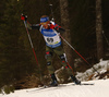 Erik Lesser of Germany skiing during the Men sprint race of IBU Biathlon World Cup in Pokljuka, Slovenia. Men sprint race of IBU Biathlon World cup was held on Thursday, 17th of December 2015 in Pokljuka, Slovenia.

