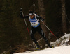 Ivan Joller of Switzerland skiing during the Men sprint race of IBU Biathlon World Cup in Pokljuka, Slovenia. Men sprint race of IBU Biathlon World cup was held on Thursday, 17th of December 2015 in Pokljuka, Slovenia.
