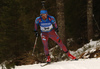 Fourth placed Alexey Slepov of Russia skiing during the Men sprint race of IBU Biathlon World Cup in Pokljuka, Slovenia. Men sprint race of IBU Biathlon World cup was held on Thursday, 17th of December 2015 in Pokljuka, Slovenia.
