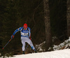 Mikko Loukkaanhuhta of Finland skiing during the Men sprint race of IBU Biathlon World Cup in Pokljuka, Slovenia. Men sprint race of IBU Biathlon World cup was held on Thursday, 17th of December 2015 in Pokljuka, Slovenia.
