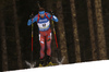 Dmitry Malyshko of Russia skiing during the Men sprint race of IBU Biathlon World Cup in Pokljuka, Slovenia. Men sprint race of IBU Biathlon World cup was held on Thursday, 17th of December 2015 in Pokljuka, Slovenia.
