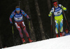 Alexey Volkov of Russia (L) and Miha Dovzan of Slovenia skiing during the Men sprint race of IBU Biathlon World Cup in Pokljuka, Slovenia. Men sprint race of IBU Biathlon World cup was held on Thursday, 17th of December 2015 in Pokljuka, Slovenia.
