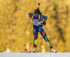 Winner Marie Dorin Habert of France skiing in the Women sprint race of IBU Biathlon World Cup in Pokljuka, Slovenia. Women sprint race of IBU Biathlon World cup was held on Friday, 18th of December 2015 in Pokljuka, Slovenia.
