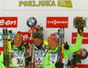 Winner Marie Dorin Habert of France (M), second placed Laura Dahlmeier of Germany (L) and third placed Franziska Hildebrand of Germany celebrate their medals won in the Women sprint race of IBU Biathlon World Cup in Pokljuka, Slovenia. Women sprint race of IBU Biathlon World cup was held on Friday, 18th of December 2015 in Pokljuka, Slovenia.
