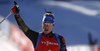 Winner Simon Schempp of Germany crossing finish line and celebrating his victory in the Men pursuit race of IBU Biathlon World Cup in Pokljuka, Slovenia. Men pursuit race of IBU Biathlon World cup was held on Saturday, 19th of December 2015 in Pokljuka, Slovenia.
