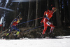 Ole Einar Bjoerndalen of Norway (R) and Martin Fourcade of France (L) skiing in the Men pursuit race of IBU Biathlon World Cup in Pokljuka, Slovenia. Men pursuit race of IBU Biathlon World cup was held on Saturday, 19th of December 2015 in Pokljuka, Slovenia.
