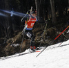 Martin Jaeger of Switzerland skiing in the Men pursuit race of IBU Biathlon World Cup in Pokljuka, Slovenia. Men pursuit race of IBU Biathlon World cup was held on Saturday, 19th of December 2015 in Pokljuka, Slovenia.
