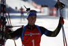 Winner Simon Schempp of Germany celebrates his victory in the Men pursuit race of IBU Biathlon World Cup in Pokljuka, Slovenia. Men pursuit race of IBU Biathlon World cup was held on Saturday, 19th of December 2015 in Pokljuka, Slovenia.
