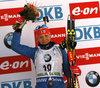 Kaisa Makarainen of Finland celebrates her medal won in the Women pursuit race of IBU Biathlon World Cup in Pokljuka, Slovenia. Women pursuit race of IBU Biathlon World cup was held on Saturday, 19th of December 2015 in Pokljuka, Slovenia.
