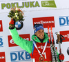 Simon Schempp of Germany celebrates his medall won in the Men pursuit race of IBU Biathlon World Cup in Pokljuka, Slovenia. Men pursuit race of IBU Biathlon World cup was held on Saturday, 19th of December 2015 in Pokljuka, Slovenia.

