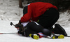 Megan Tandy of Canada collapses during the Women pursuit race of IBU Biathlon World Cup in Pokljuka, Slovenia. Women pursuit race of IBU Biathlon World cup was held on Saturday, 19th of December 2015 in Pokljuka, Slovenia.
