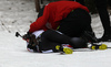Megan Tandy of Canada collapses during the Women pursuit race of IBU Biathlon World Cup in Pokljuka, Slovenia. Women pursuit race of IBU Biathlon World cup was held on Saturday, 19th of December 2015 in Pokljuka, Slovenia.
