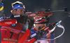 Anton Shipulin of Russia getting ready for shooting in the Men mass start race of IBU Biathlon World Cup in Pokljuka, Slovenia. Men mass start race of IBU Biathlon World cup was held on Sunday, 20th of December 2015 in Pokljuka, Slovenia.
