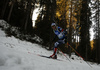Dominik Windisch of Italy skiing in the Men mass start race of IBU Biathlon World Cup in Pokljuka, Slovenia. Men mass start race of IBU Biathlon World cup was held on Sunday, 20th of December 2015 in Pokljuka, Slovenia.
