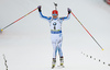 Winner Kaisa Makarainen of Finland celebrating her victory while crossing finish line in the Women mass start race of IBU Biathlon World Cup in Pokljuka, Slovenia. Women mass start race of IBU Biathlon World cup was held on Sunday, 20th of December 2015 in Pokljuka, Slovenia.
